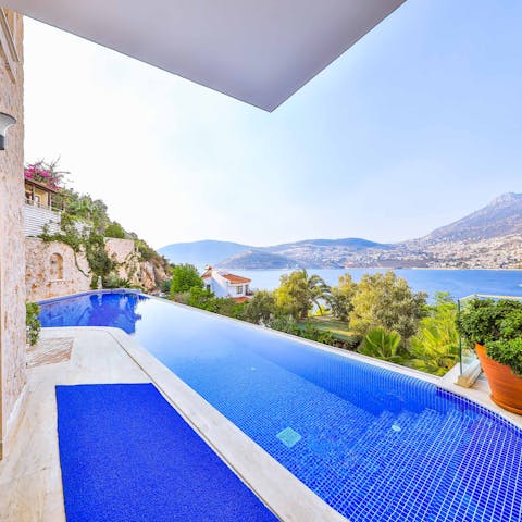 Take a dip in the infinity pool overlooking the stunning coastline