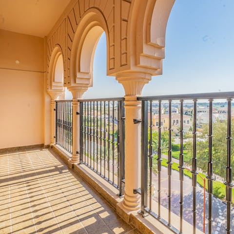 Sip your morning coffee on the private balcony while taking in palm-fringed views of your neighbourhood