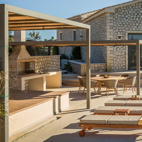 Dine alfresco at each of the villa's three barbecues