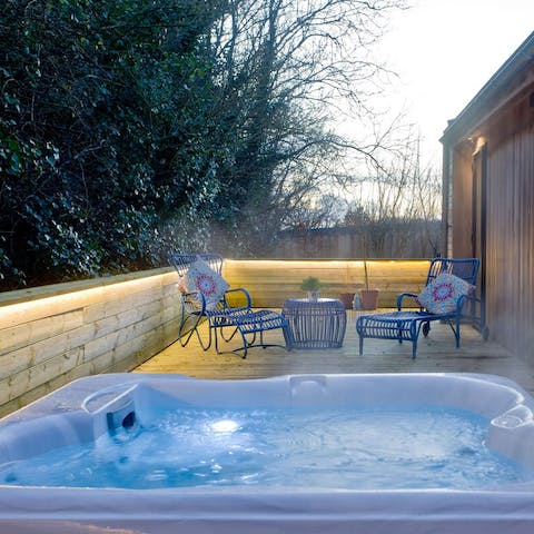 Soak your stresses away in the steaming hot tub 