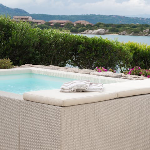 Relax in the Jacuzzi while enjoying the view