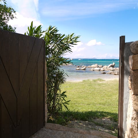 Enjoy direct access to a private sandy beach
