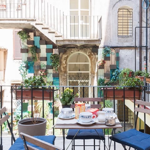 Your charming balcony and communal courtyard