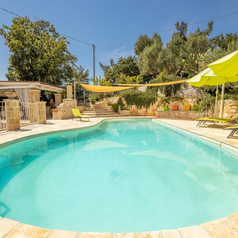 Immerse yourself in the cool of the lagoon shaped pool at the heart of the garden