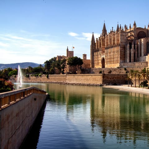 Visit the gorgeous honey-coloured Cathedral of Santa Maria of Palma, a six-minute stroll from this home