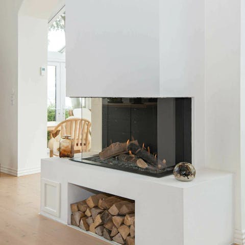 Light up the wood-burning stove and get cosy around the modern hearth