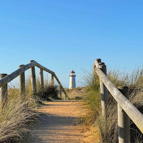 Start your mornings with a stroll along Talacre Beach, a ten-minute drive away