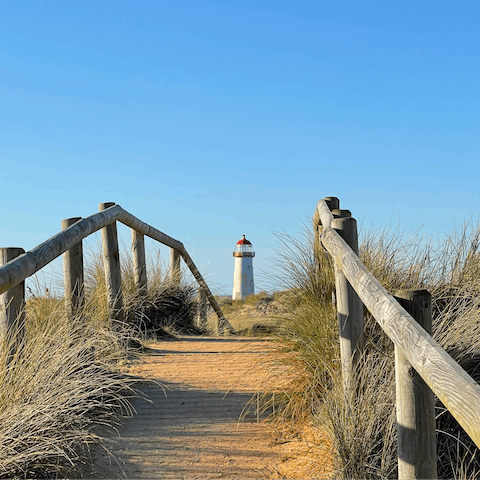 Start your mornings with a stroll along Talacre Beach, a ten-minute drive away