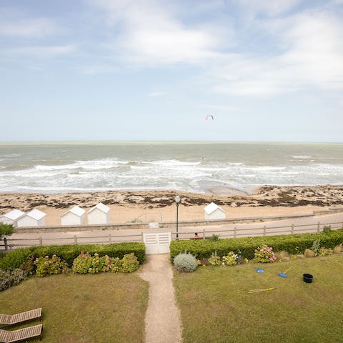 Cross the street to reach Saint-Aubin-sur-Mer's beach and go for a dip in the sea