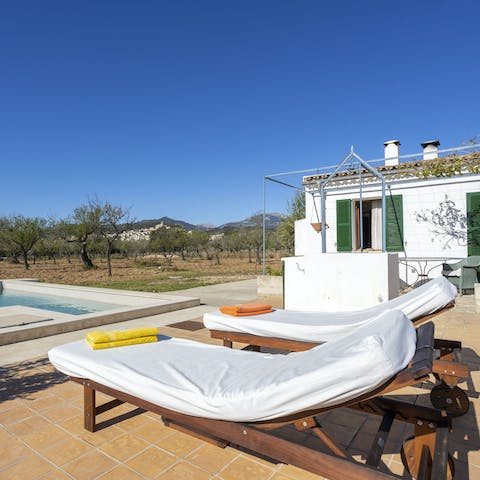 Worship the Mallorcan sunshine from the poolside loungers 