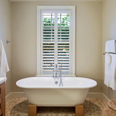 Soak in the freestanding tub in the master ensuite
