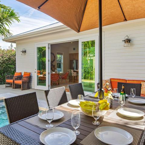 Gather everyone around the alfresco dining table for margaritas