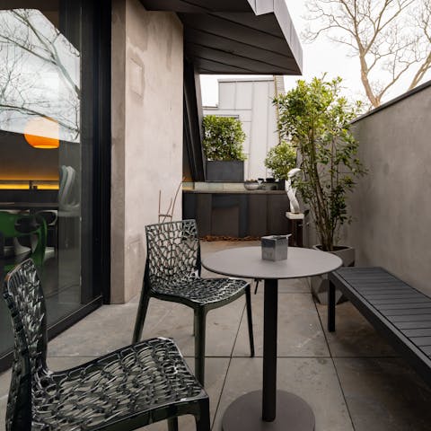 Enjoy your morning coffee in the private patio garden
