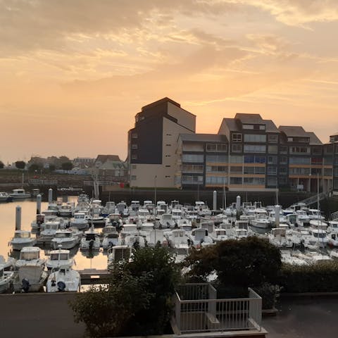 Take in views over the marina of Courseulles-sur-Mer