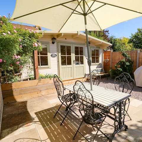 Delight in drinking and dining alfresco in the spring and summertime in your pretty private garden