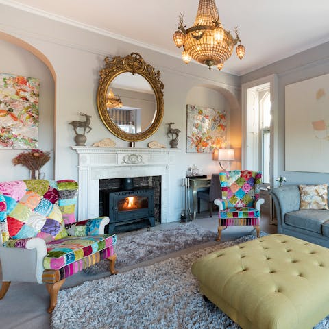 Light up the Victorian fireplace in the eye-catching living room