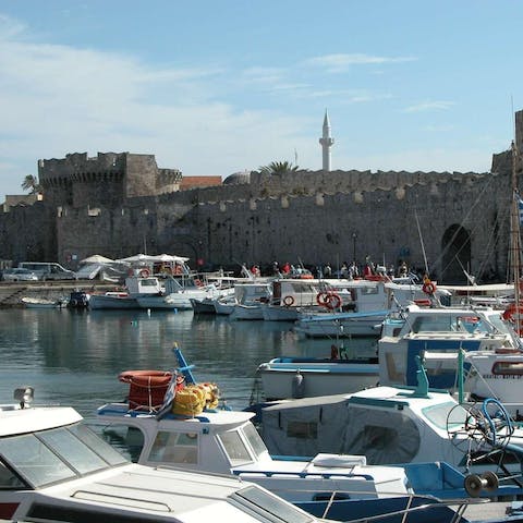 Drive ten minutes to reach the ancient walled city of Rhodes