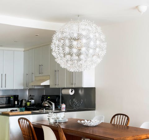 The fun chandelier above the dining table