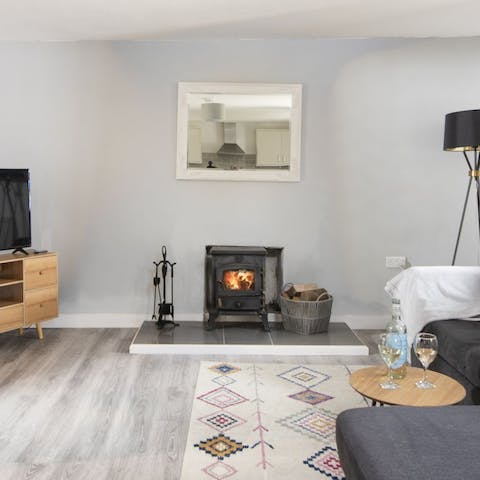 Snuggle up in front of the log burner during winter stays