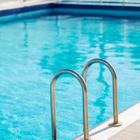 Cool off with a dip in the building's communal pool