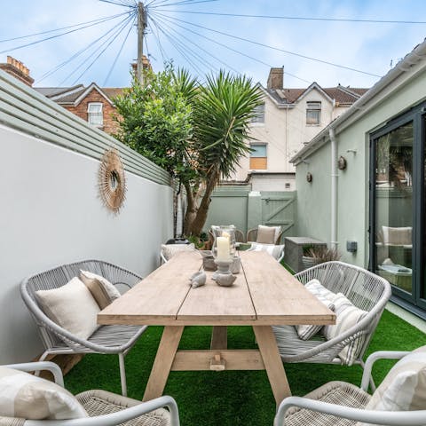 Enjoy an evening tipple in the small garden