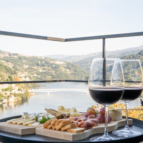 Admire the Douro Valley views on the balcony, a glass of wine in hand