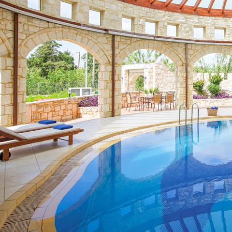 Enjoy a lovely dip to cool off from the summer heat in the indoor swimming pool