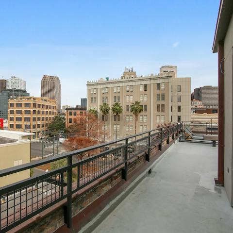 Dine al fresco on the rooftop terrace while soaking up the city views