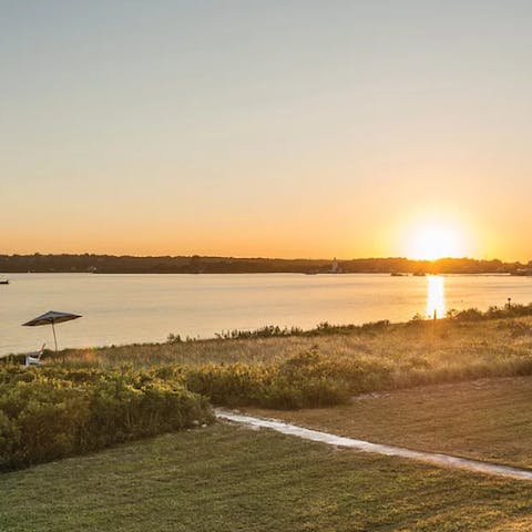 Watch the sunset over Lake Montauk each evening