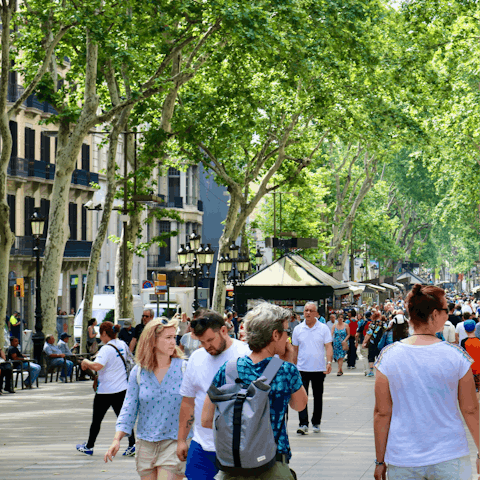 Pick up some flowers from the stalls on Las Ramblas nearby 