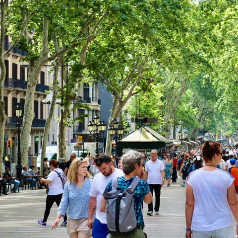 Pick up some flowers from the stalls on Las Ramblas nearby