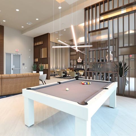 Challenge a neighbour to a game of pool in the lounge area