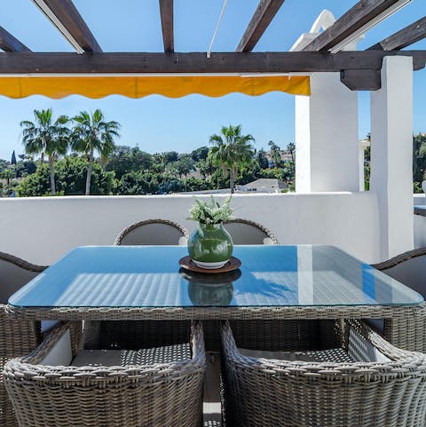 Dine alfresco on your stylish rattan set while you gaze at the stunning views