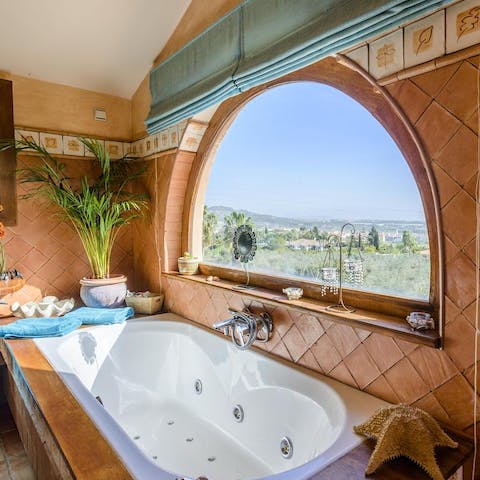 Soak up country views as you relax in the whirlpool bathtub