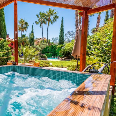 Savour a glass of sherry as you soak in the outdoor Jacuzzi