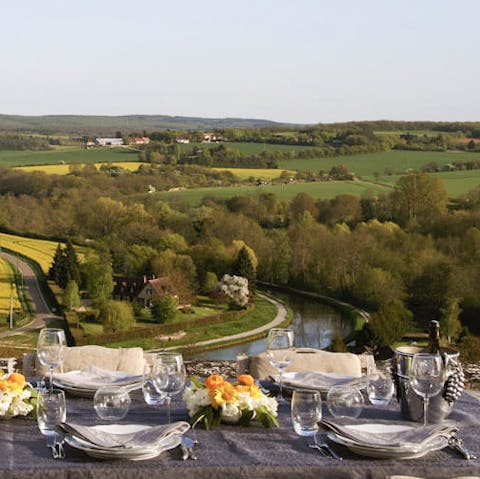 Dine al-fresco with the Burgundy countryside before you