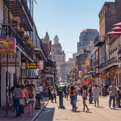 Explore vibrant Bourbon Street, just a short stroll from your door
