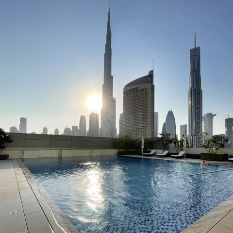 Take in a view of the world's tallest building from the cool of the swimming pool