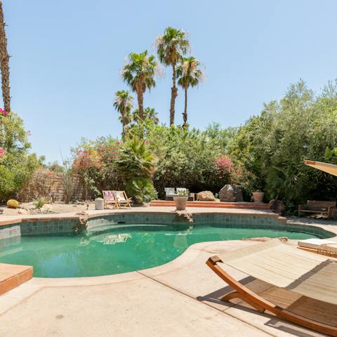 Spend leisurely days relaxing by the private pool