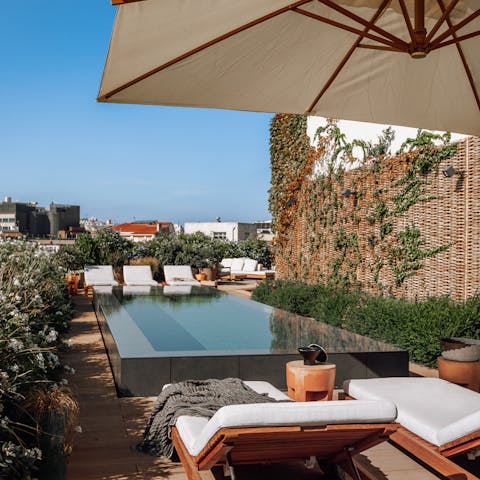 Escape the city on the shared terrace, perfect for an afternoon dip