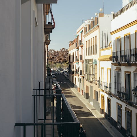 Perch with your morning coffee over the balcony, watching the locals go about their day