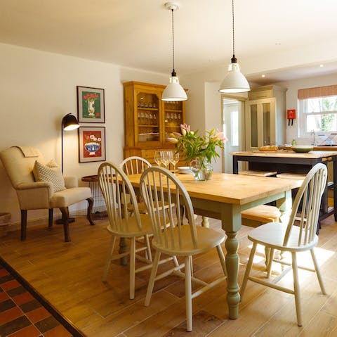 Share memorable meals around the charming open kitchen and dining space
