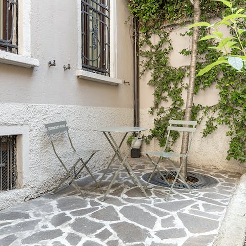 Sip your morning espresso in the leafy communal courtyard