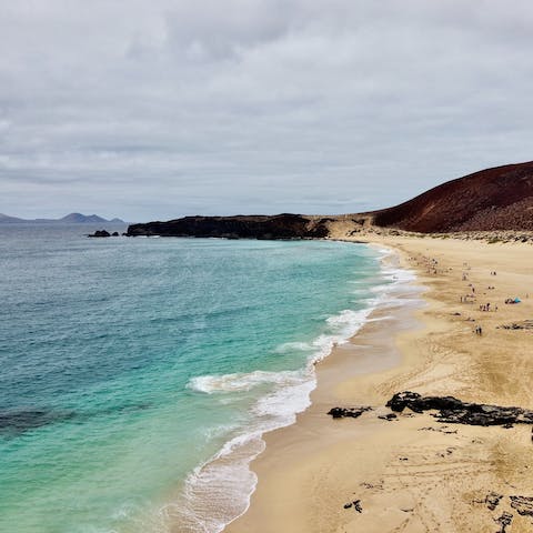 Take a short stroll to the sands of Playa Dorada