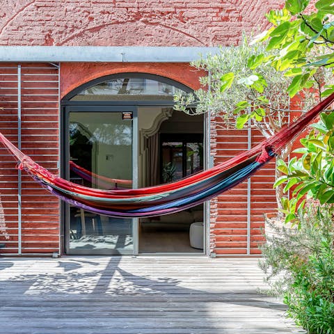 Grab a book off the shelf and swing in the hammock on relaxed days