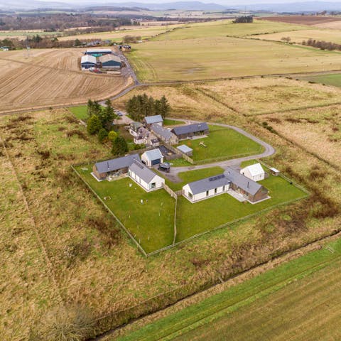 Stay on a family farm outside Aberdeen, surrounded by rolling fields 