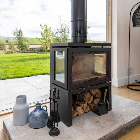 Get cosy in front of the fire after a long walk through the fields 