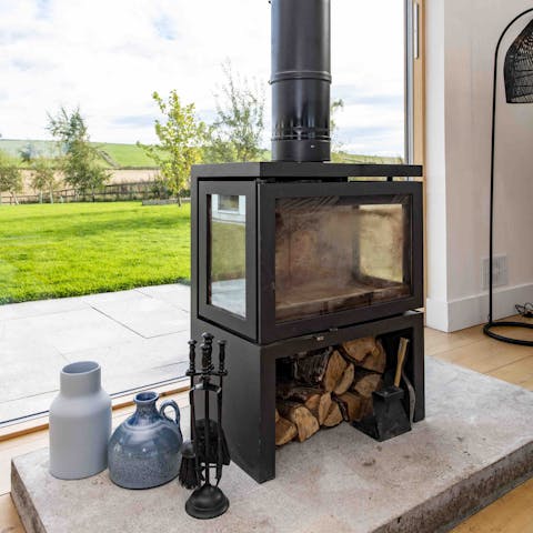 Get cosy in front of the fire after a long walk through the fields 