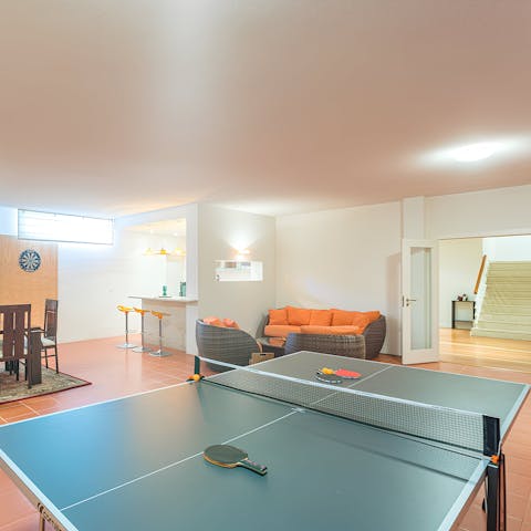 Play a few games of ping pong in the games room