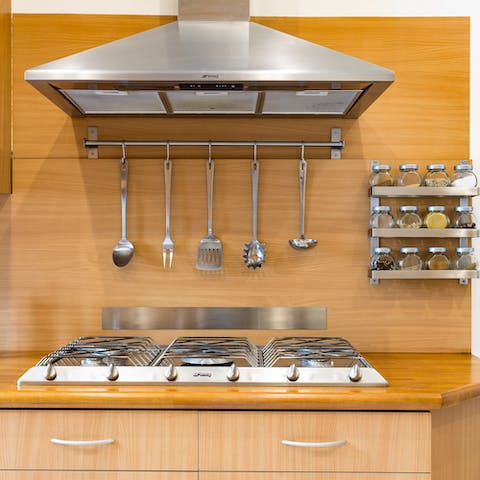 Prepare meals at home in the large and well-equipped kitchen